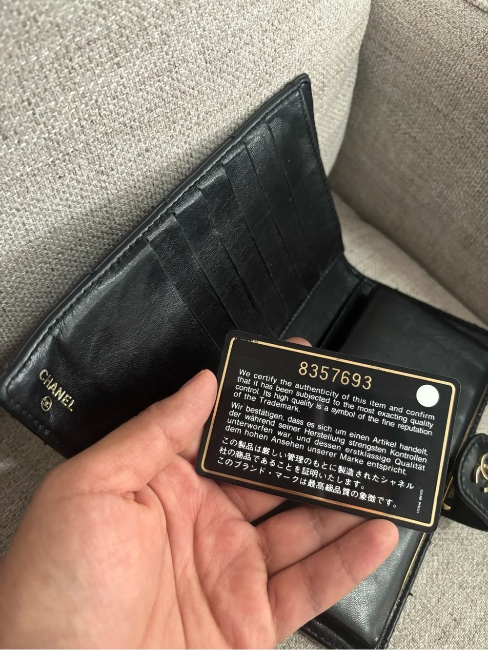 CHANEL Black Quilted Leather Wallet with Gold CC Snap